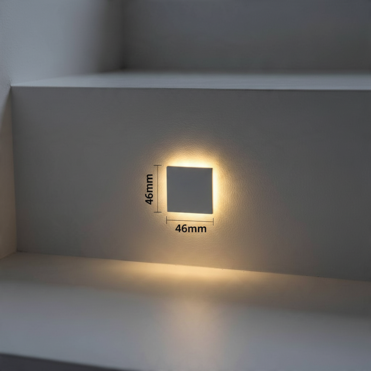 Ultra Beam Lighting Ltd square 1 watt recessed LED step light with polished aluminium faceplate on a white stair riser
