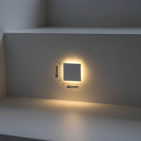 Ultra Beam Lighting Ltd square 1 watt recessed LED step light with polished aluminium faceplate on a white stair riser