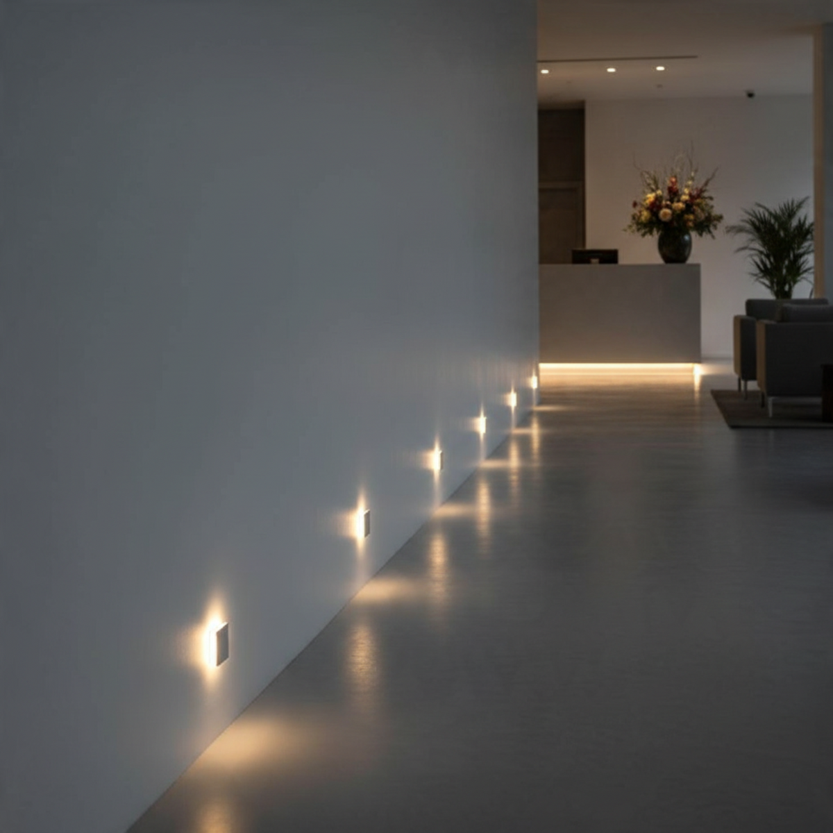 Ultra Beam Lighting Ltd square 1 watt recessed LED step lights installed along a modern interior hallway wall