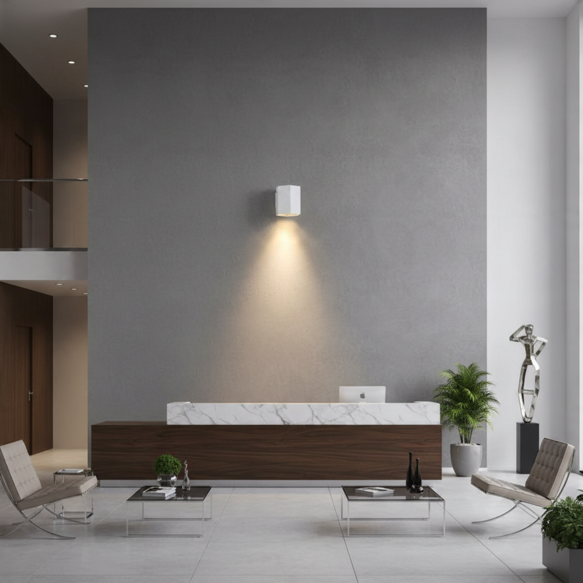 Ultra Beam Lighting Ltd white hexagonal LED wall downlight casting a warm downward beam in a modern office lobby.