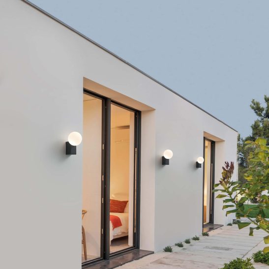 LWA500-BK outdoor wall lights fitting to an exterior wall at night