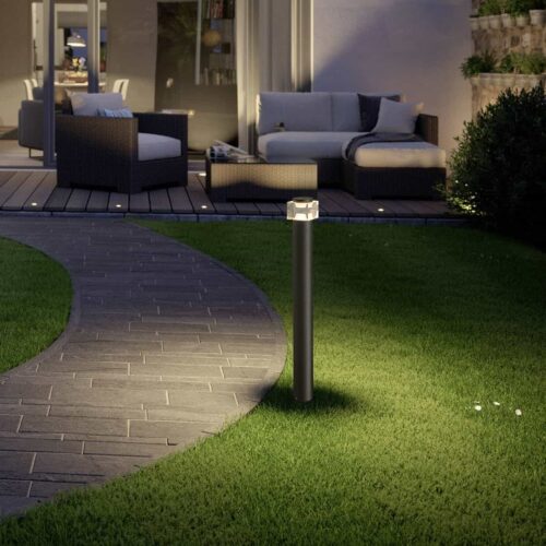 LFL067 6 watt black LED bollard light in a garden